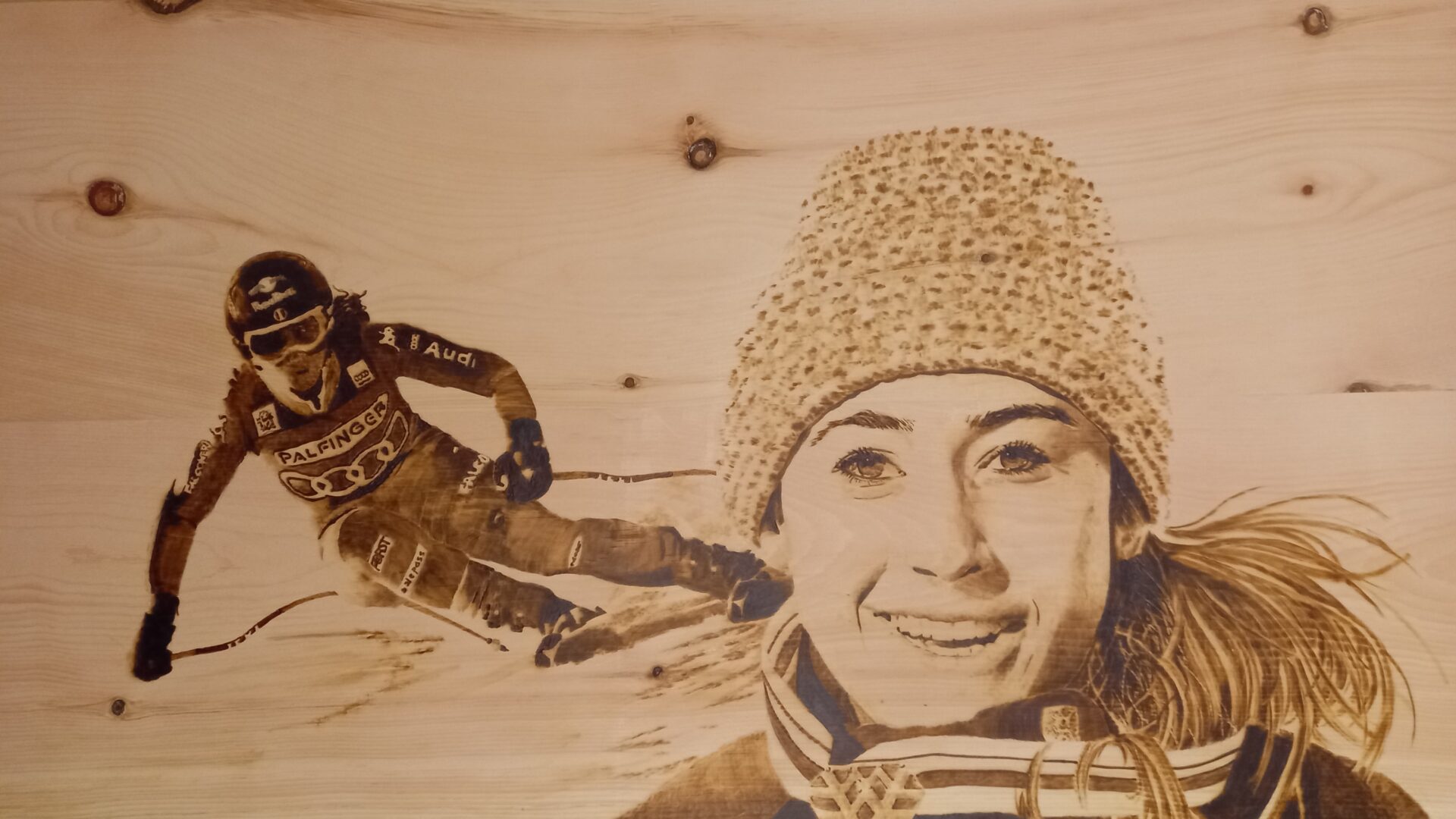 Alta velocità. Ritratto di Sofia Goggia su legno di cirmolo. Pirografia, 2022.. Pirografia, 2022